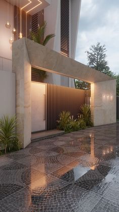 a modern house with a pool in front of it and lights hanging from the ceiling