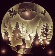 a paper cut christmas scene with reindeers and sleigh in the night sky