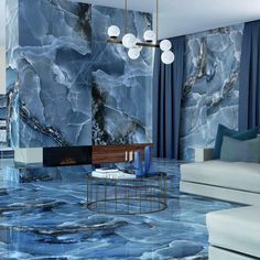 a living room with blue marble flooring and walls that look like they have been painted