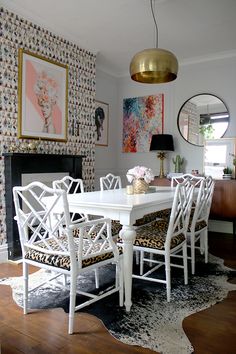 a white table and chairs in a room