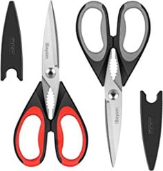 a pair of scissors with red handles and black blades on each side, all in different shapes and sizes