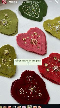 several hearts are shown on a table with the words velvet hearts in progress written below