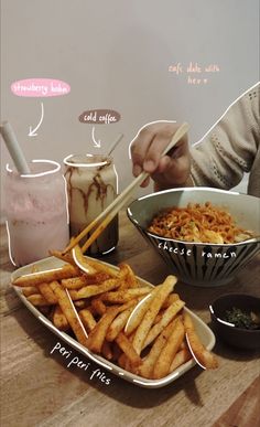 a person sitting at a table with some food in bowls and chopsticks on it