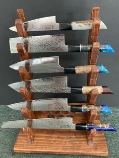 several knives are stacked on top of each other