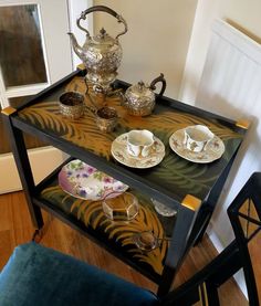 a table with plates and cups on it