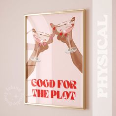 there is a framed poster hanging on the wall with wine glasses in front of it