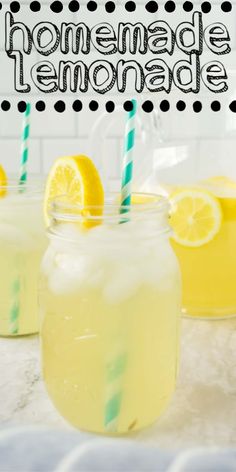 two mason jars filled with lemonade sitting on top of a counter