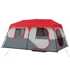 a red and gray tent with windows on the front is set up against a white background