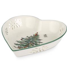 a heart shaped dish with a christmas tree on it