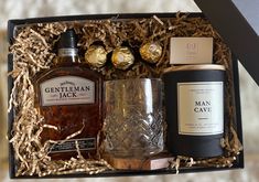 the gentleman's gift box includes two bottles of whiskey and an ice bucket