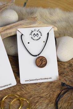 "A surfer inspired walnut wood pendant made for daily wear. This casual wave style looks great as a standalone piece or layered for a more inspired boho look.  This piece has a laser cut wave design on a small finished walnut disc, strung on black waxed cotton cord. Features an adjustable lobster clasp. This item is handmade to order and requires approx 2 business days from start to shipping.  This piece can be worn in water but we recommend avoiding wearing in water to increase the longevity of Obx Outer Banks, Wave Pendant, Wood Creations, Wood Pendant, Wave Design, Necklace Black, Boho Look, Boho Beach, Wood Jewellery