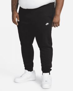 A closet staple, the Nike Sportswear Club Fleece Joggers combine a classic look with the soft comfort of fleece for an elevated, everyday look that you can wear every day. Shown: Black/Black/White Style: BV2671-010 Nike Sweatpants Outfit, Outfit Male, Nike Sportswear Club Fleece, Sweatpants Outfit, Nike Sweatpants, Fleece Joggers, Black White Fashion, White Style, Nike Sportswear