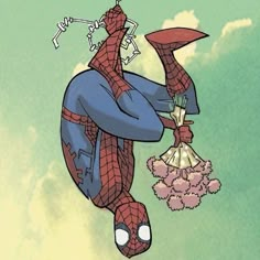 a spider - man hanging upside down from the sky with his hands in his pockets