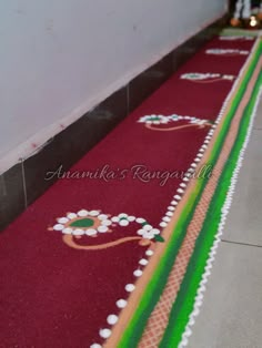 the floor is decorated with colorful designs and ribbons on it's sides, along with other decorations