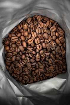 a bag filled with lots of coffee beans