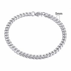 DESCUBRA A ELEGÂNCIA E A FORÇA EM UMA SÓ PEÇA: PULSEIRA MASCULINA CUBANA PRATA Você está pronto para elevar seu estilo ao próximo nível? Apresentamos a Pulseira Masculina Cubana Prata, uma peça que combina elegância atemporal com robustez masculina. Esta pulseira é mais do que um acessório – é uma declaração de poder, sofisticação e bom gosto. DESIGN SOFISTICADO E MODERNO Nossa pulseira é meticulosamente trabalhada com um design cubano, caracterizado por elos largos e brilhantes que capturam a l Classic Punk, Dermal Anchor, Smiley Piercing, Wrist Jewelry, Basic Jewelry, Conch Piercing, Lip Piercing, Estilo Punk, Tragus Piercings