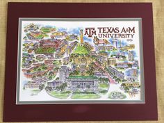 the texas am university campus map is displayed on a wall in front of a brown frame