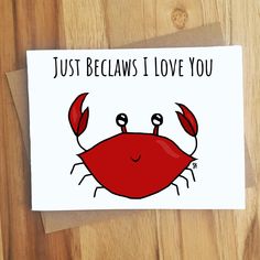 a card that says, just because i love you with a cartoon crab on it