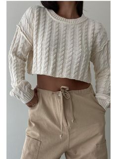 The coziest Cable Knit Cropped Sweater in Cream will be your go to seasonal top. DETAILS Cropped Thick cable knit Cream color 100% COTTON Et Clet is a women's contemporary clothing brand that offers timeless yet modern styles for the fashion-forward woman. With its focus on effortless style and timeless design, Et Clet is a go-to brand for the modern woman who wants to elevate her wardrobe. Cable Knit Cropped Sweater, Cotton Cable Knit Cropped Sweater For Fall, Cotton Cable Knit Sweater For Loungewear, Cozy Cable Knit Tops For Loungewear, Cable Knit Cotton Cropped Sweater For Fall, Cotton Cable Knit Top For Fall, Fall Cotton Cable Knit Top, Fall Cable Knit Cotton Top, Cropped Cable Knit Sweater With Crew Neck