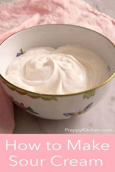 a bowl filled with sour cream on top of a pink towel