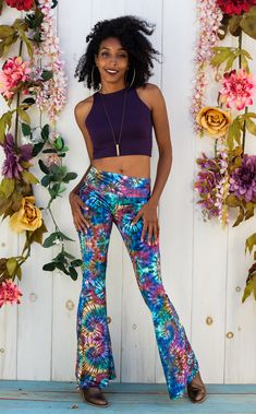 The Slim Bell Pants are the go to every day pant...comfortable is sexy. Design Features: Original Tie Dye Artwork created BenJammin of The Jammin Warrior Collective Wider waistband hits just under belly button Low rise center seam Hugs hips and legs to knee Slight flare at knee Great for every day, dance, movement, hooping and yoga Made in San Francisco, CA, USA Fabric Features: American Made Fabric printed in our studio in Novato, CA. Soft textured velvet. 90% Polyester / 10% Spandex. Fit: True Velvet Bell Bottoms, Coral Tie, Flaming Lips, Velvet Flare Pants, Warrior Within, Bell Pants, Tie Dye Jumpsuit, Velvet Hoodie, Port Angeles