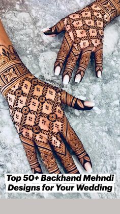 two hands with henna tattoos on them, one is showing off the intricate design