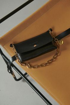 Vicky universal black leather phone belt with gold chain. To preserve the beauty of your accessory, avoid the use of harsh chemicals and keep it out of the reach of children. Belt Bag, Phone Accessories, Gold Chain, Gold Chains, Chemicals, The Beauty, Houston, Black Leather, Boutique