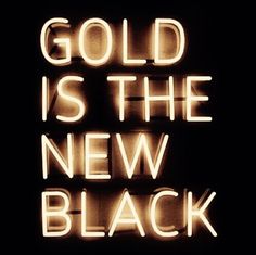 a neon sign that says gold is the new black