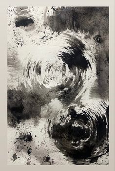 an abstract painting with black and white colors