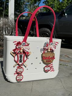 a large white bag with baseball themed decorations on it