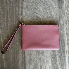 Brand New, Never Used, Pink Coach Wristlet. Care Instructions Card Included. Inside Is Made Up A Maroon Material, With Gold Hardware. Strap Wrist Is Not Detachable! Coach Emblem Is Written In Hold As Well! Coach Wristlet Pouch For Daily Use, Coach Wristlet With Zipper Pouch For Daily Use, Coach Zipper Pouch Wristlet, Coach Wristlet With Zipper Pouch, Coach Zipper Wristlet, Pink Coach Wristlet, Care Instructions Card, Coach Wristlet, Coach Bags