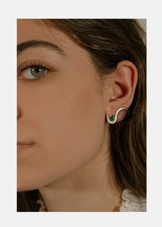 —The Trace Collection Crafted of solid 18K gold, the Emerald Trace Earring features a soft fluid line that cascades around the ear. Sold as singles. Please specify preferred side. For a pair, add a Left and Right to your order. 1" in length | 0.19tcw (F/G color, VS clarity) 0.40ct Pear Cut Emerald Available in Yellow Gold, White Gold, Rose Gold Custom variations can be made with alternative stone sizes. For inquiries: bespoke@katkimfinejewelry.com Please note: All our pieces are made to order an Emerald Ear Cuff, Pear Jewelry, Side Earrings, Gold Coin Jewelry, Earrings With Stones, Emerald Earring, Jewelry Product Shots, Minimal Jewellery, Neck Pieces Jewelry