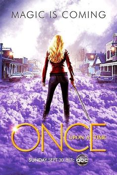 the poster for once is shown in front of a storefront window with an image of a woman standing on snow covered ground