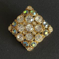 Wowza!! This Vintage Brooch Is A Showstopper!! Unused Old Stock And In Mint Condition. Features Clear Rhinestones, Pale Blue Ab Rhinestones, Faux Pearls, And Goldtone. Wear On Jacket, Dress, Sweater, Top, Hat, Bag, In Hair, As Boutonnire, And More. Perfect Gift For Collectors. Gifts. Collectible. Bridal. Formal. Bridesmaids. Prom. Neutral. Bling. Rhinestones. Coastal Cowgirl. Classic. Pearls. From Smoke Free Dog Friendly Home. Bling Rhinestones, Dress Sweater, Coastal Cowgirl, Pearl Brooch, Vintage Brooch, Vintage Rhinestone, Top Hat, Dog Friendly, Clear Rhinestones