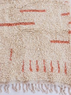 nola shag rug nursery rug cream rug wool rug handcrafted rug ethical rug fare trade artisanal women business Wool Shag Rug, Rug Cream, Rug Nursery, Nursery Rug, Cream Rug, The Atlas, Leather Ottoman, Nursery Rugs, Pink Design