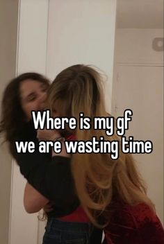 two women hugging each other in front of a mirror with the words where is my gf