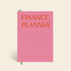 a pink book with the words finance planner written on it's front and side