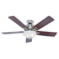 a ceiling fan with two wooden blades and a white light on the top of it