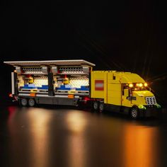 a lego truck is shown with its lights on