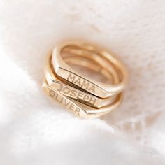 A popular mother-daughter gift, our Personalised Stacking Ring can be engraved with the name, initials, or short word of your choice to create the perfect gift for any occasion. Handcrafted and beautifully presented in 18ct Gold Vermeil or Sterling Silver, this enchanting ring can be worn solo for a chic and sophisticated daytime look or stacked with other rings from our exclusive online collection for dramatic evening style. Effortlessly stylish and easy to wear with any outfit, it will make a Yellow Gold Stacking Rings, Branded Gift Bags, Engraved Silver Ring, Secret Message Bracelet, Mothers Day Rings, Personalized Leather Bracelet, Stylish Name, Message Bracelet, Ring Name