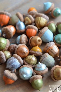 two pictures of different colored acorns on a table