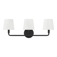 a bathroom light with three lamps on the front and side of it, in an old - fashioned black finish