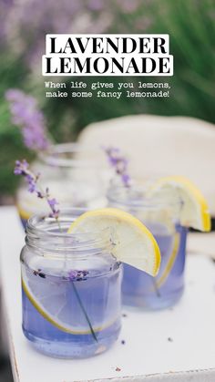 lavender lemonade in mason jars on a table with the words lavender lemonade written above them