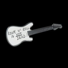 a white guitar with the words rock'n'roll is not dead on it