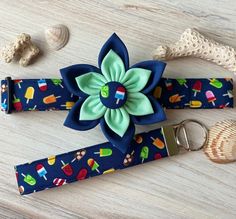 a dog collar with a flower on it