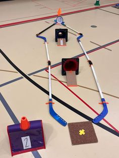 an indoor play area for children to play with their numbers on the board and track