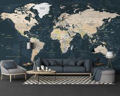 a living room with a large world map on the wall