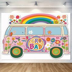 an image of a van with flowers and rainbows on it