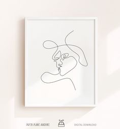 a minimal line drawing of a woman's face on a white background with the words paper plane machine above it