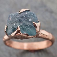 a close up of a ring with a stone in it